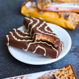 Überzogener Cookie Dough Quest Proteinriegel